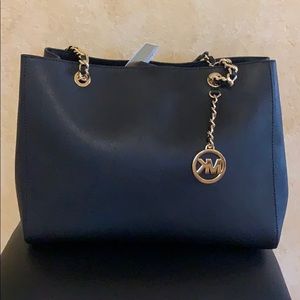 Brand new Michael kors black leather purse